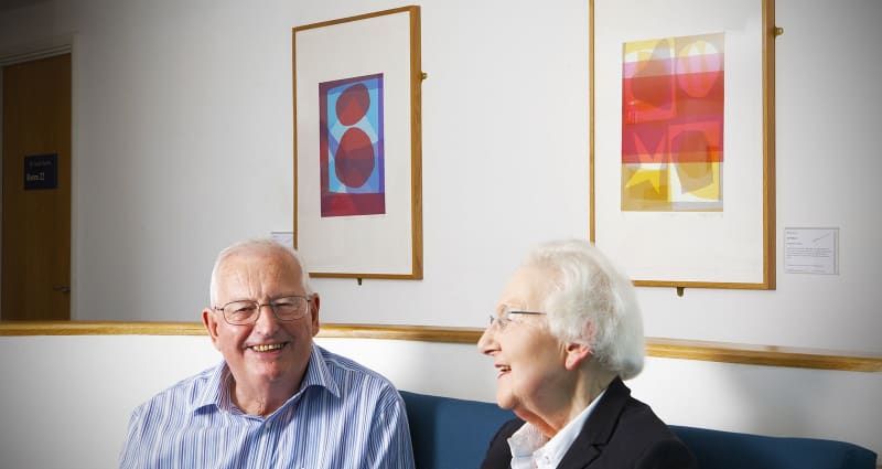 Older people at Bedminster Family Practice, with artworks by Biddy Bunzl